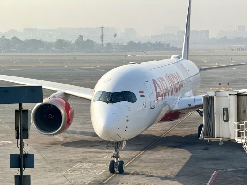 a white airplane on a runway
