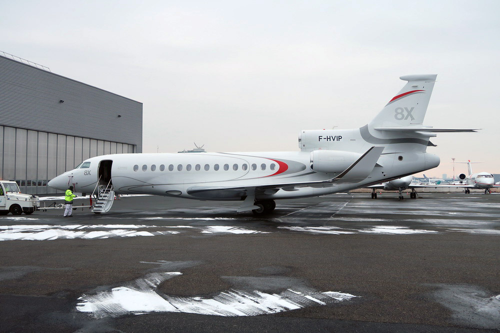a white airplane on a tarmac