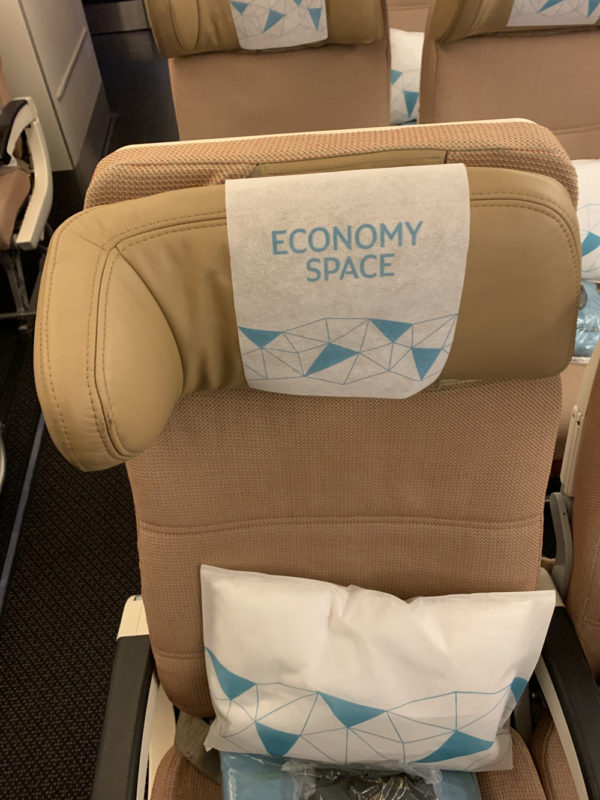 a seat with a white paper on it