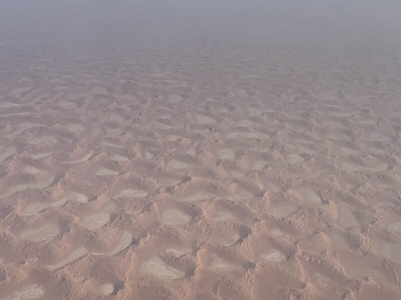 a sand dunes with ripples