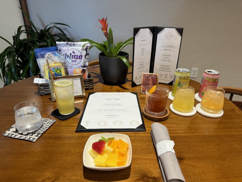 a table with drinks and food on it