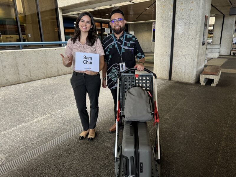 a man and woman standing next to each other