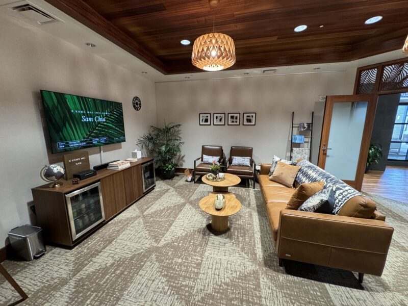 a room with a television and couches