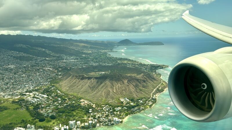 an aerial view of a city and a body of water