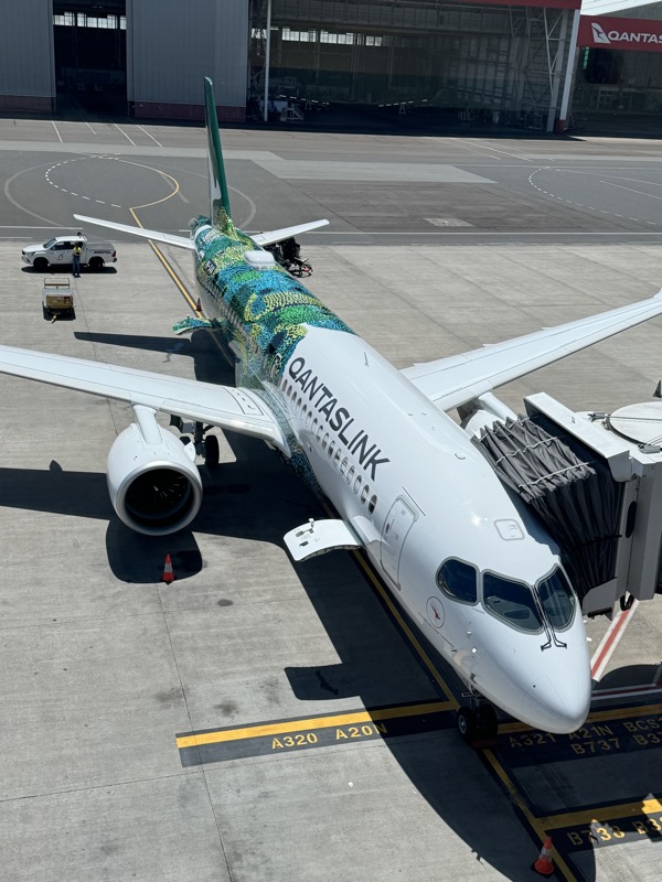 an airplane parked on a tarmac