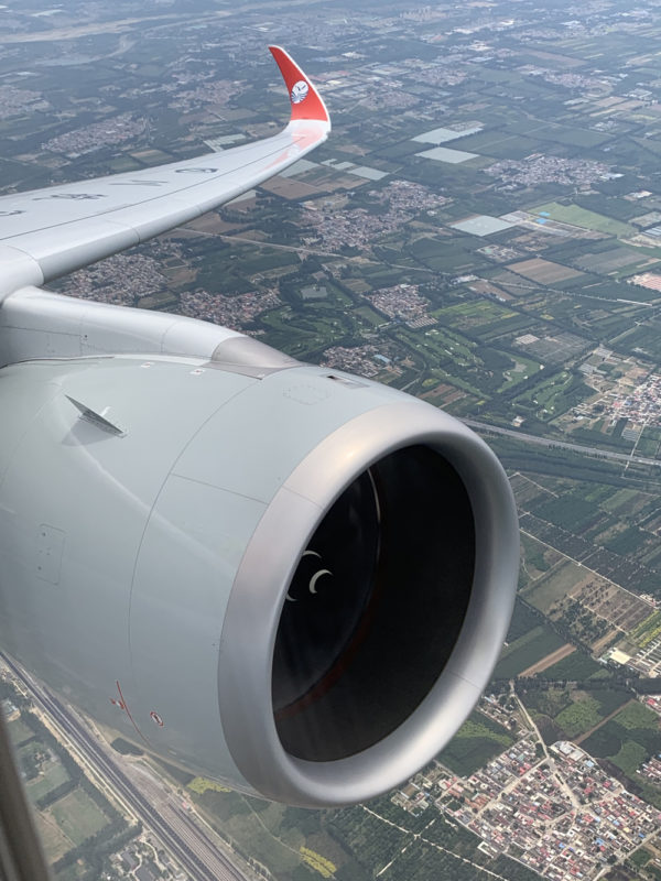 an airplane wing with a large engine