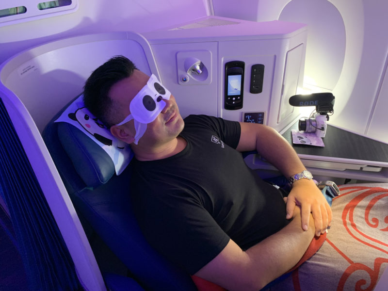 a man lying down with eyes on his eyes