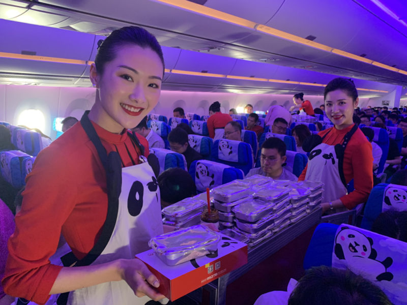 a group of people in an airplane