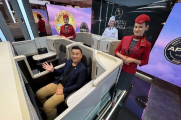 a man and woman in a chair